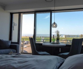 Fewo 304 mit Meerblick und Strandkorb im Haus Jan am Strand in Döse