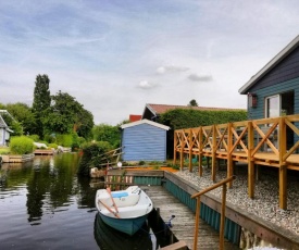 Ferienhaus Heinkens Hoek mit eigenem Bootssteg