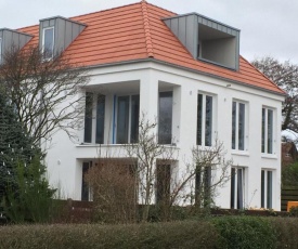 Strandvogt - wunderschöne Ferienwohnung mit Parkettboden und Sonnenbalkon